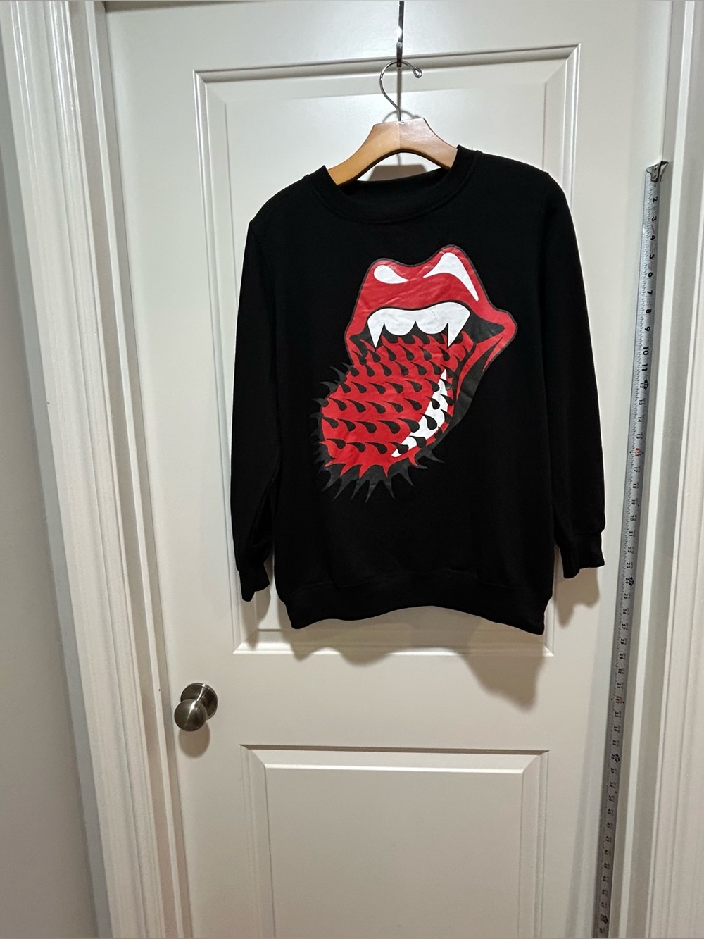 Rolling Stones women’s size XS Black Graphic Sweatshirt with Red Tongue Design